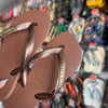 Havaianas Top + Placa Logo Dourado