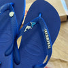 Havaianas Top + Placa Logo + Pin Golfinho, Sereia e Concha